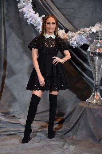 Jennifer Lopez shines like a diamond in mini lace and boots
