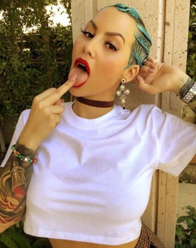 Amber Rose: New Breasts, New Outfits, New Hair!