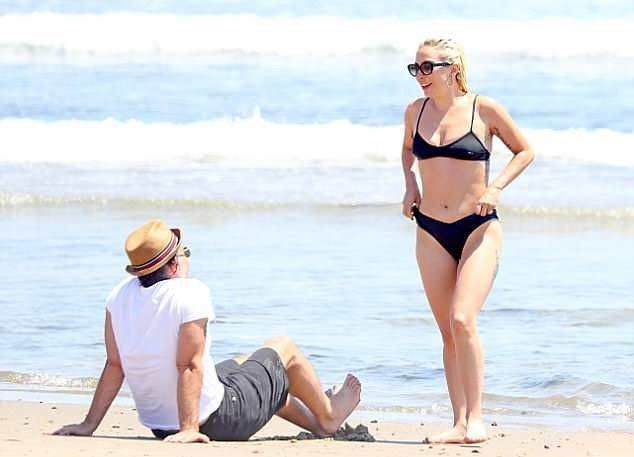 Lady Gaga and Christian Сarino enjoy a romantic break