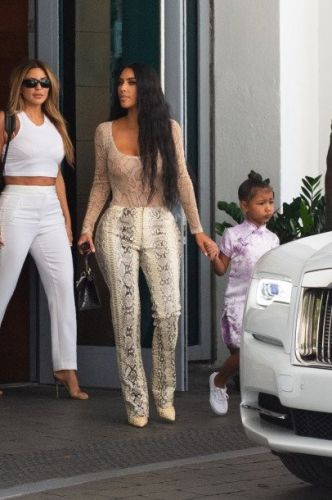 Kim Kardashian was mocked by fans for ridiculous snake trousers