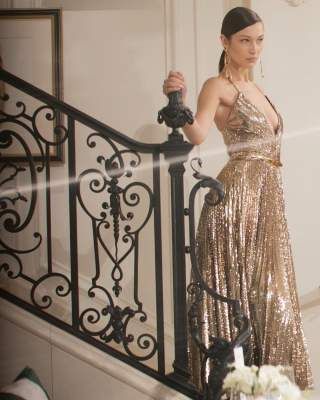 Bella Hadid admired the beauty in a golden dress from Ralph Lauren