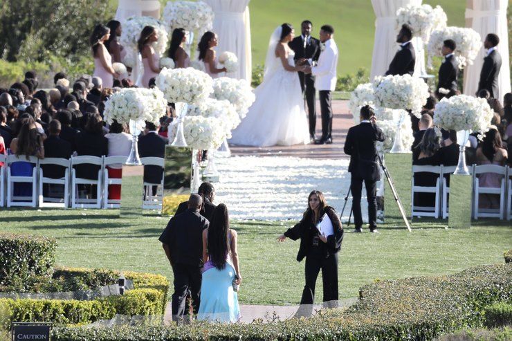 Kim Kardashian and Kanye West are late for a friend's wedding
