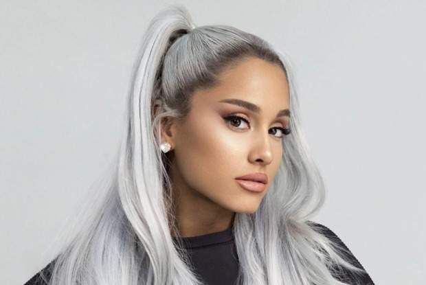 Ariana Grande shows a tomogram of her affected brain