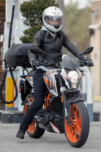 Halle Berry chases Malibu on a motorcycle