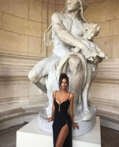 Emily Ratajkowski in a dress that hides nothing