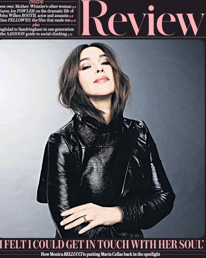 57-year-old Bellucci took a picture in a leather trench coat